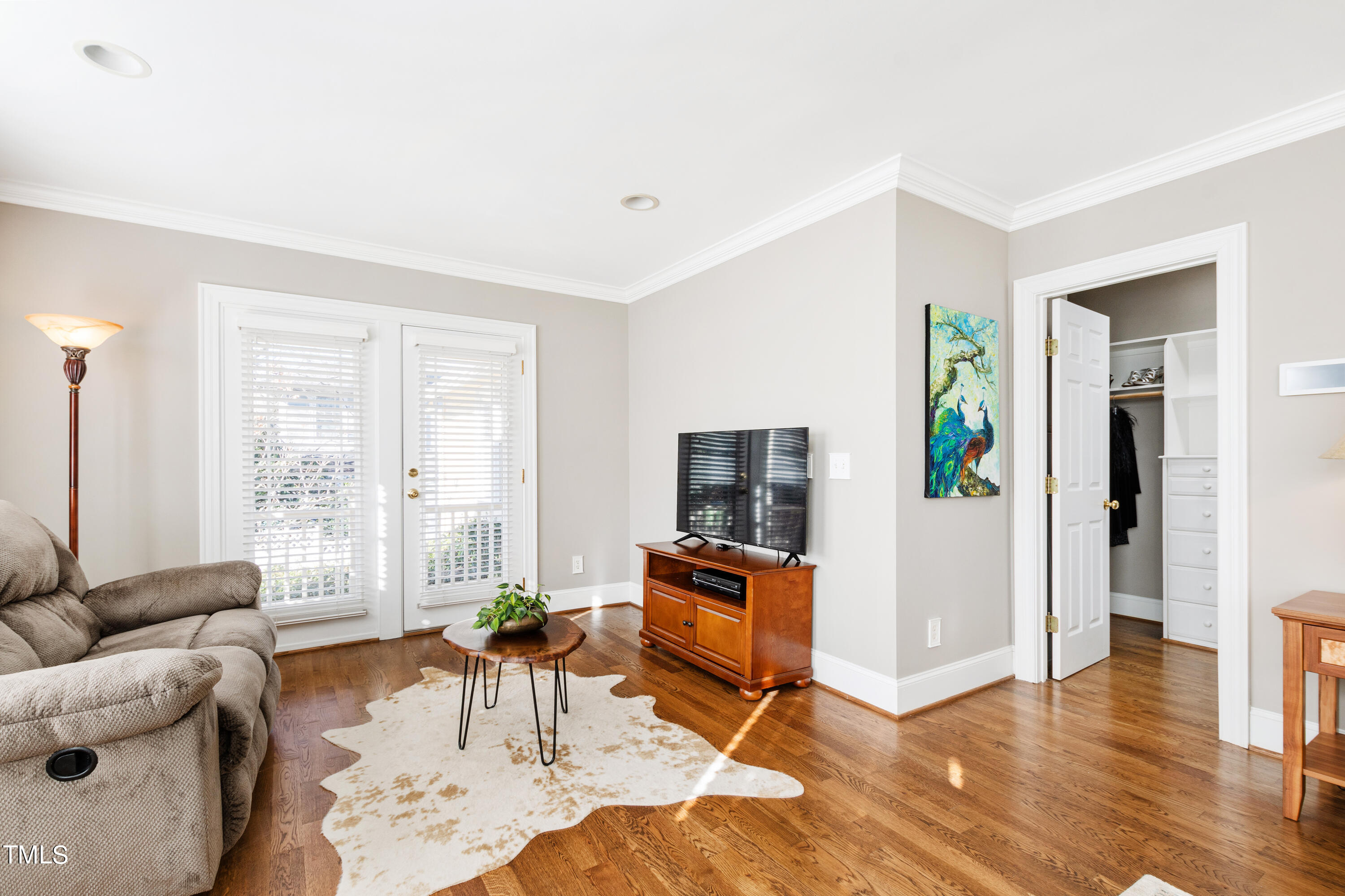 229 Woodburn Road Raleigh, NC 27605 - Photo 25 of 64 a living room with furniture and a flat screen tv