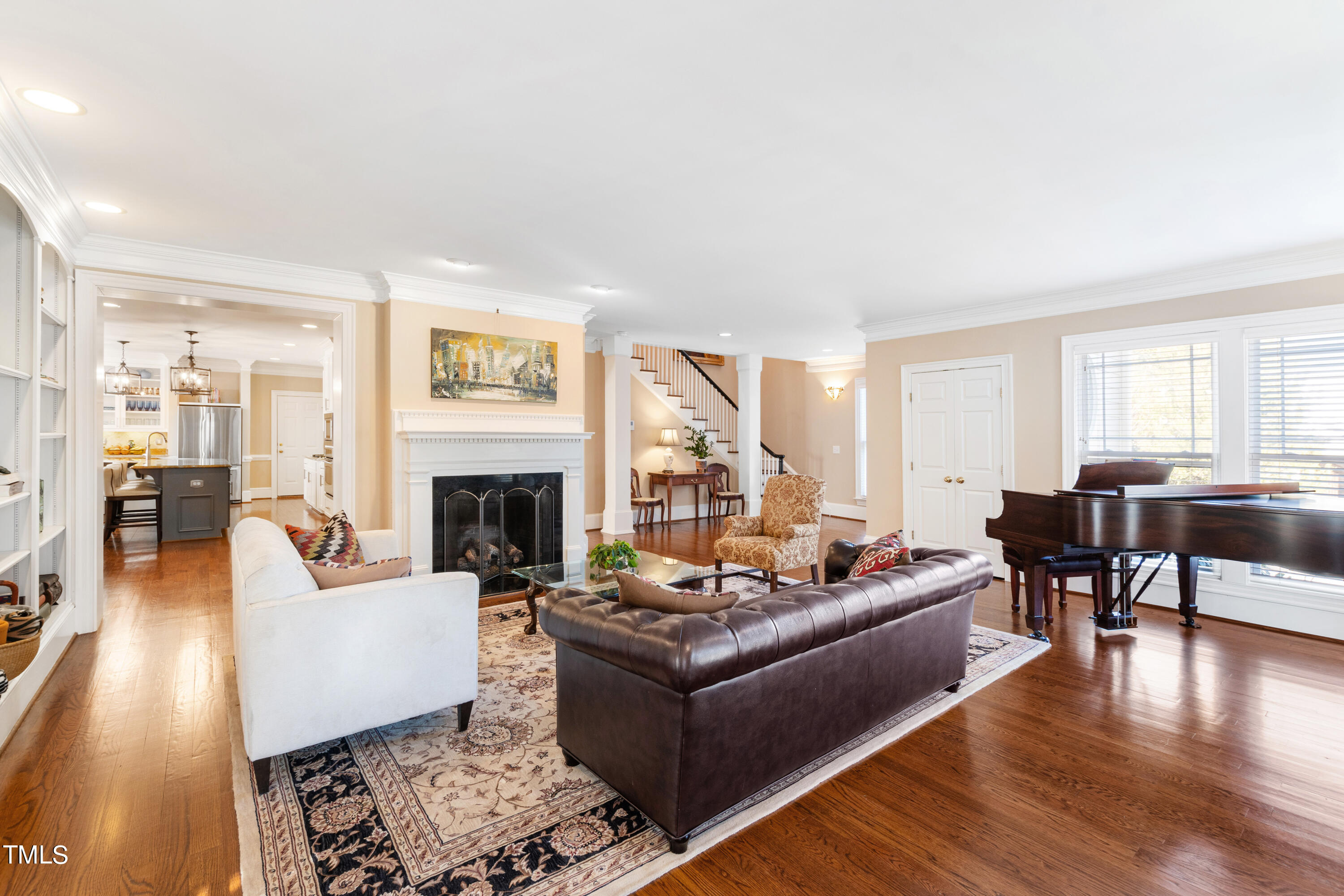 229 Woodburn Road Raleigh, NC 27605 - Photo 3 of 64 a living room with furniture and a fireplace