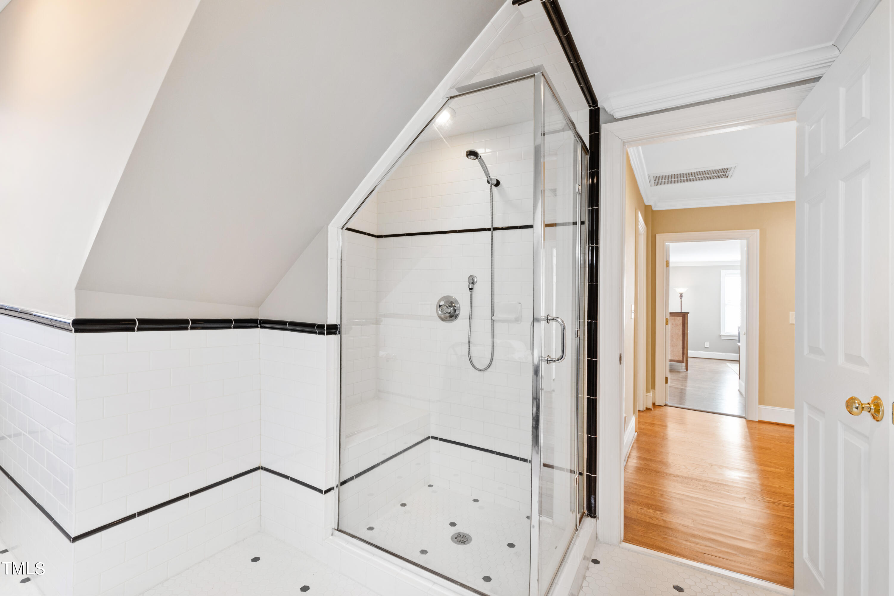 229 Woodburn Road Raleigh, NC 27605 - Photo 31 of 64 a bathroom with a glass shower door and a shower