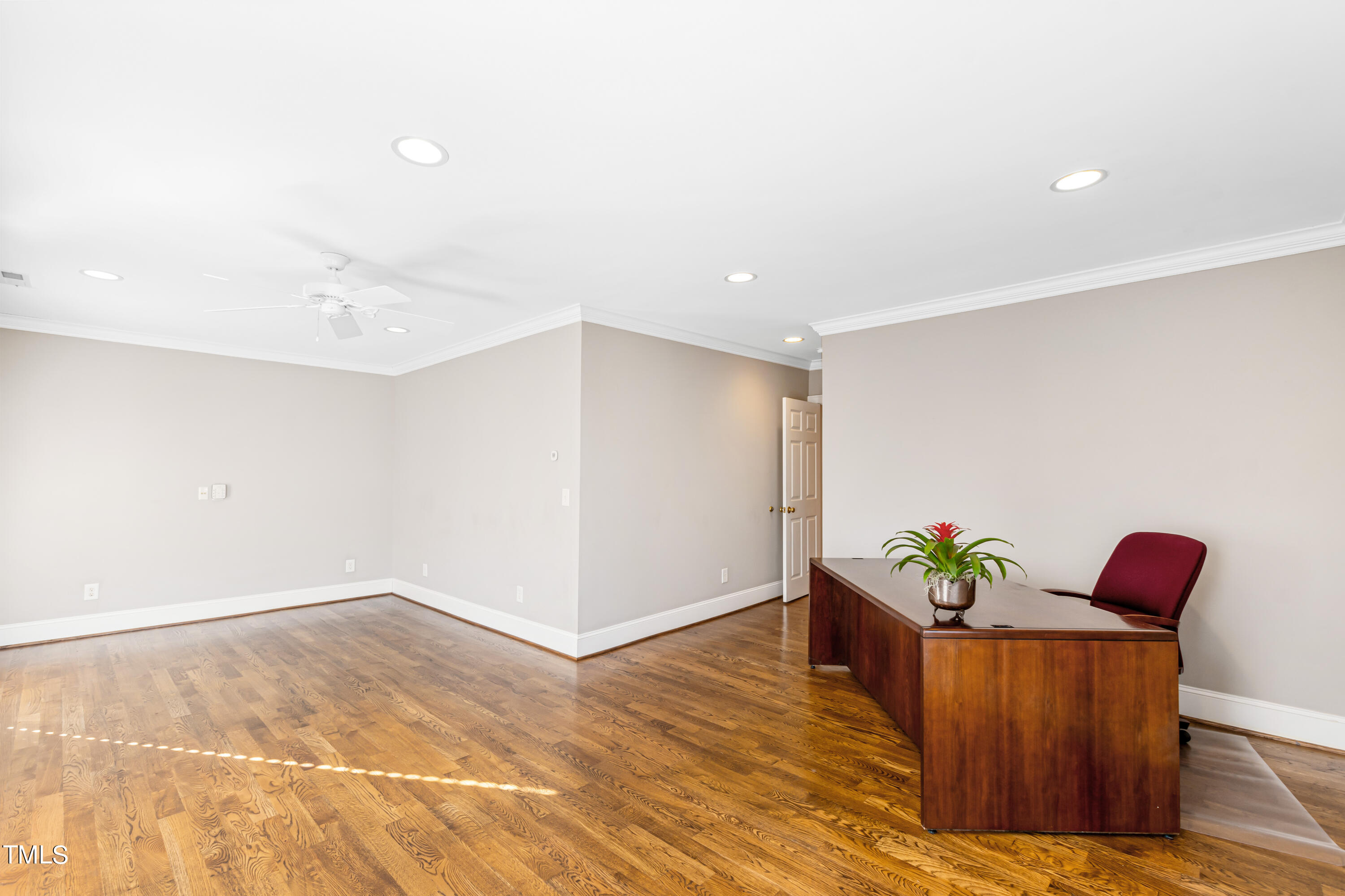 229 Woodburn Road Raleigh, NC 27605 - Photo 33 of 64 a living room with furniture and wooden floor