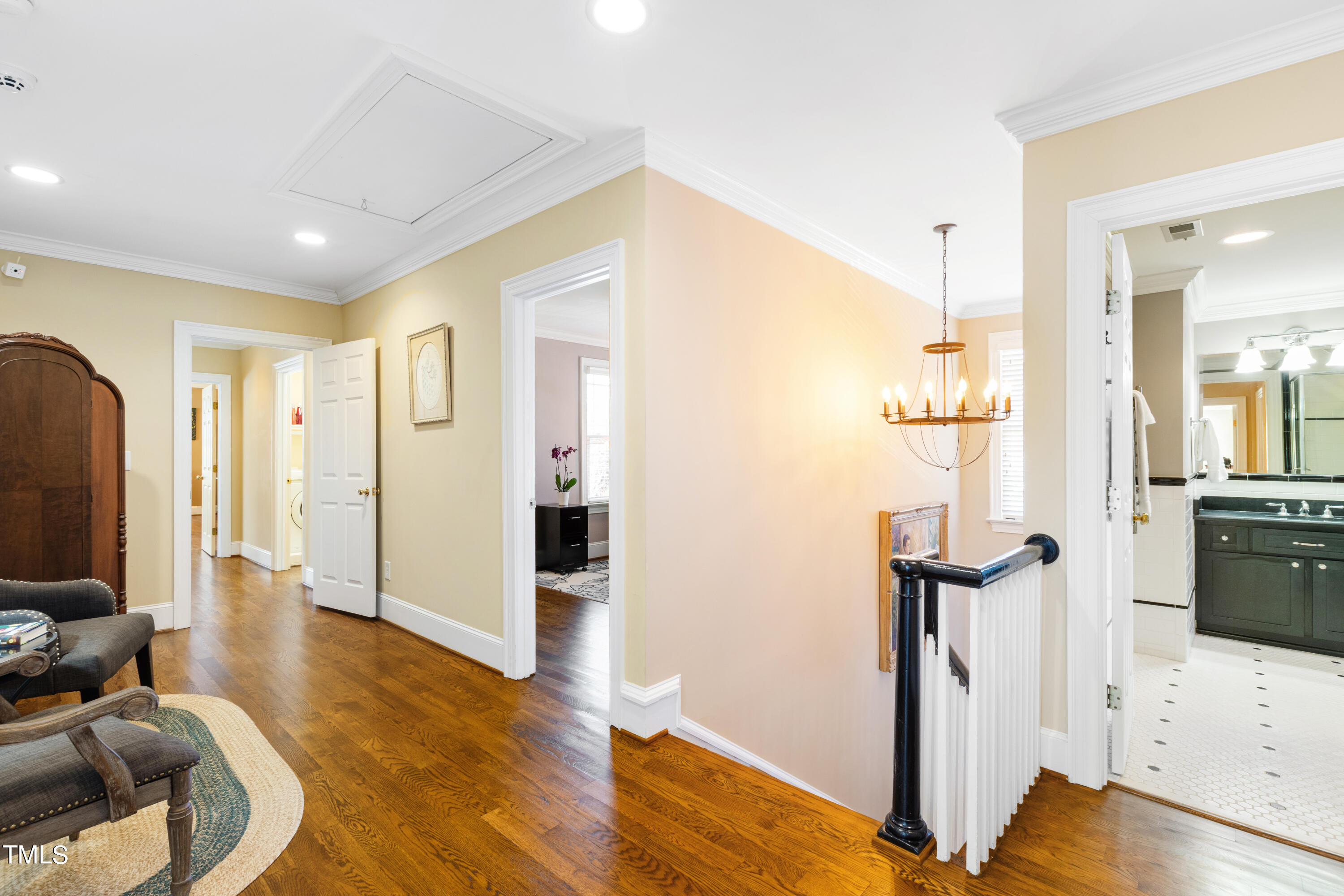 229 Woodburn Road Raleigh, NC 27605 - Photo 40 of 64 a view of a livingroom with furniture and a flat screen tv