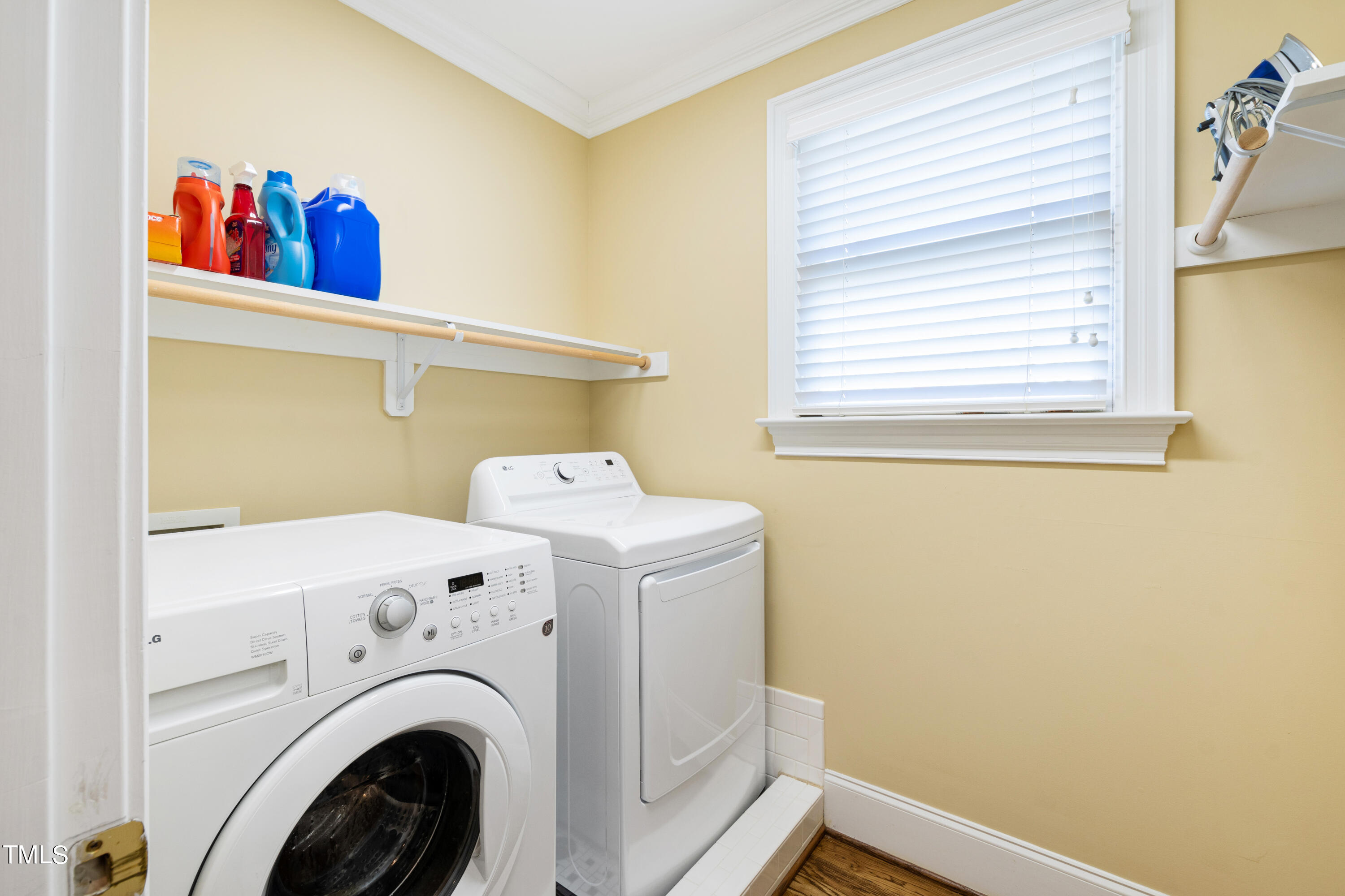 229 Woodburn Road Raleigh, NC 27605 - Photo 41 of 64 a utility room with dryer and washer