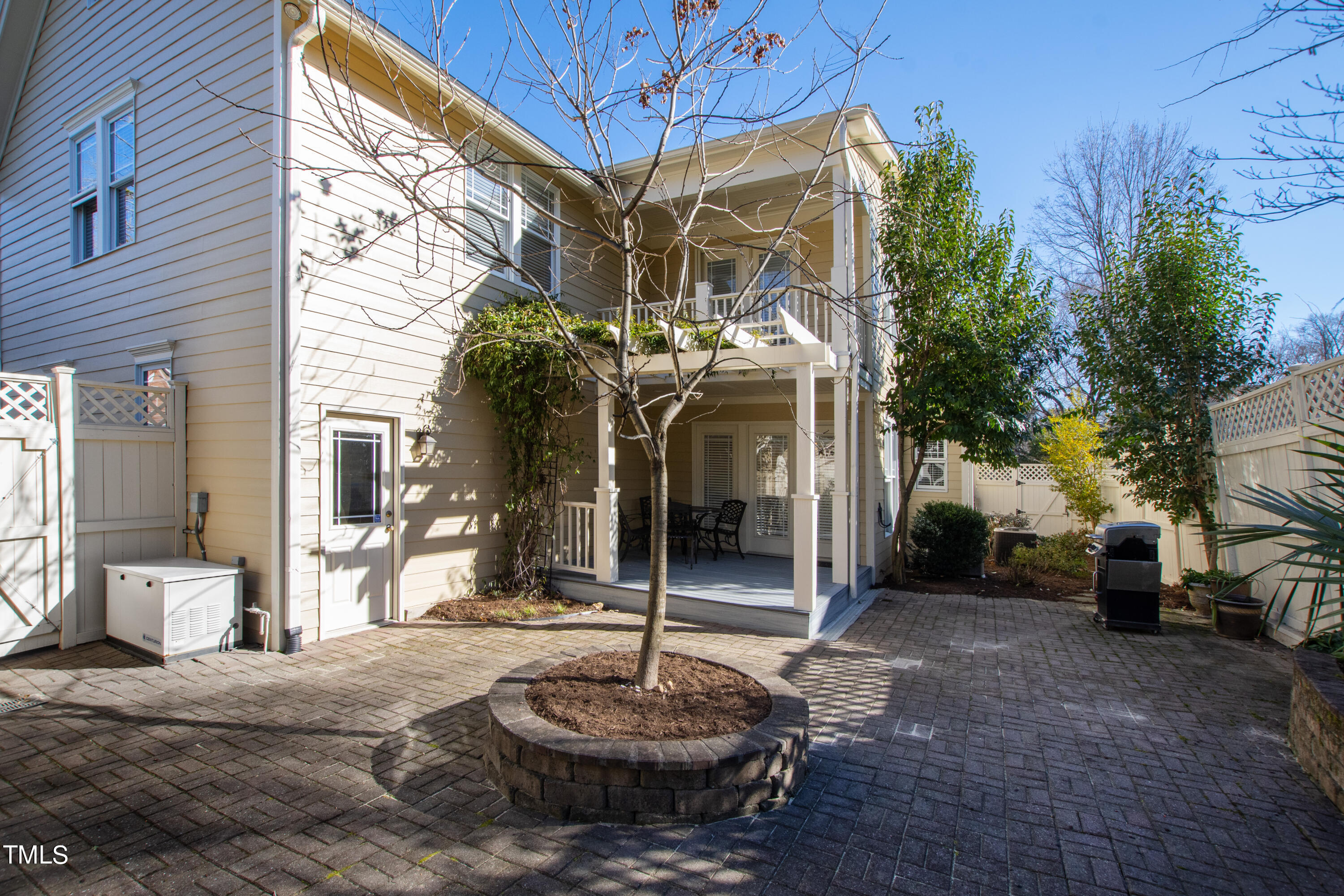 229 Woodburn Road Raleigh, NC 27605 - Photo 45 of 64 a view of a house with a cars park