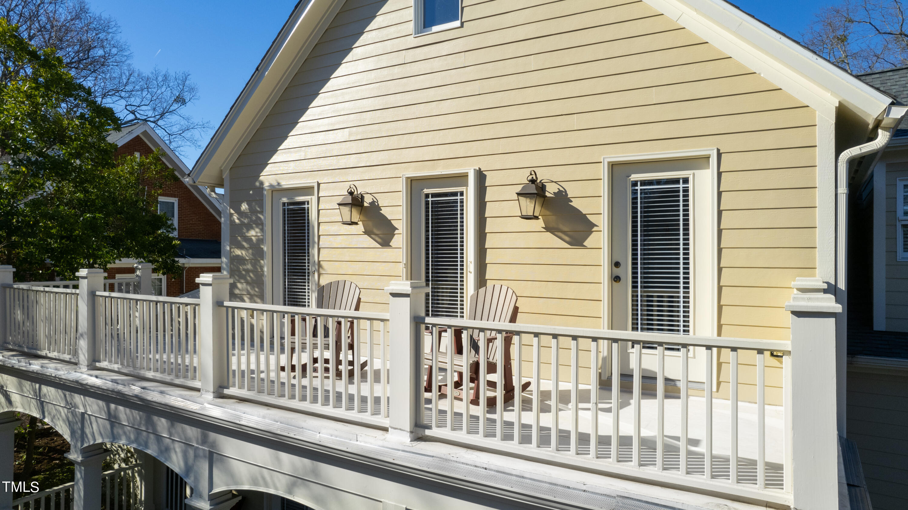 229 Woodburn Road Raleigh, NC 27605 - Photo 52 of 64 a view of a white house with a large window