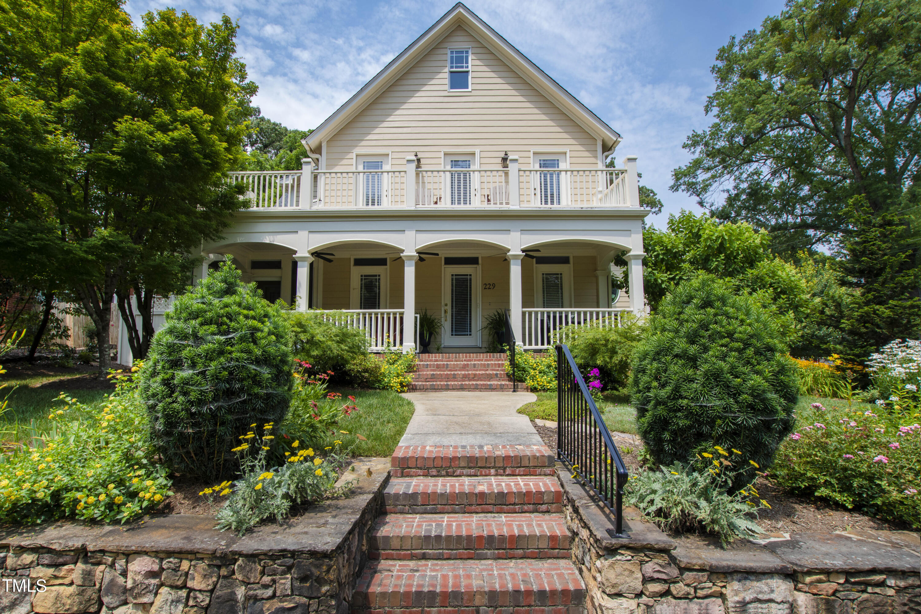 229 Woodburn Road Raleigh, NC 27605 - Photo 53 of 64 a front view of a house with a yard