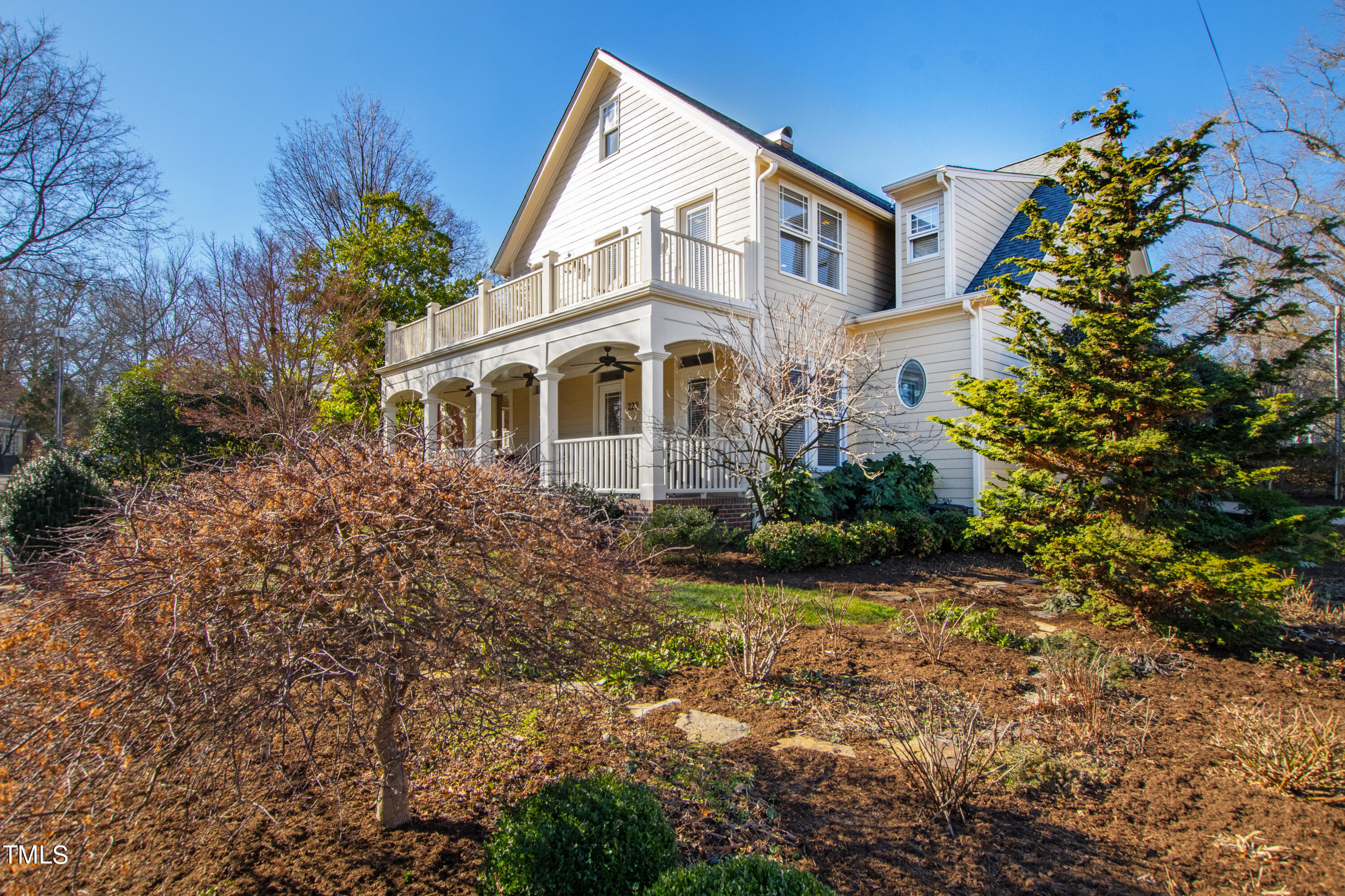 229 Woodburn Road Raleigh, NC 27605 - Photo 54 of 64 a front view of a house with garden