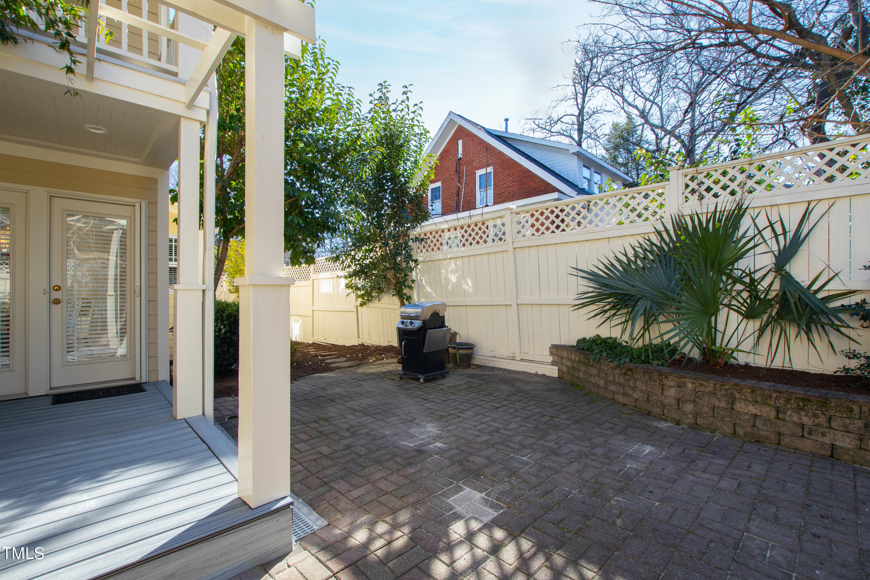 229 Woodburn Road Raleigh, NC 27605 - Photo 57 of 64 a view of a house with a yard
