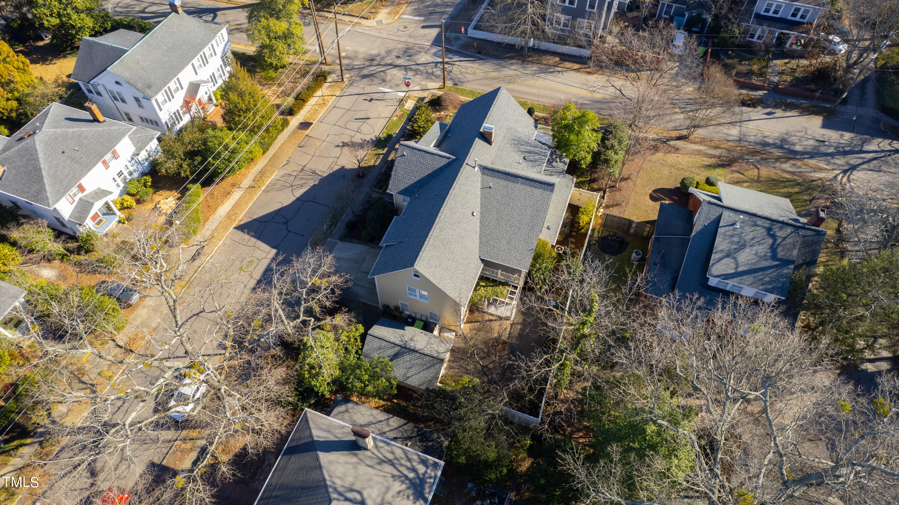 229 Woodburn Road Raleigh, NC 27605 - Photo 64 of 64 an aerial view of houses with outdoor space