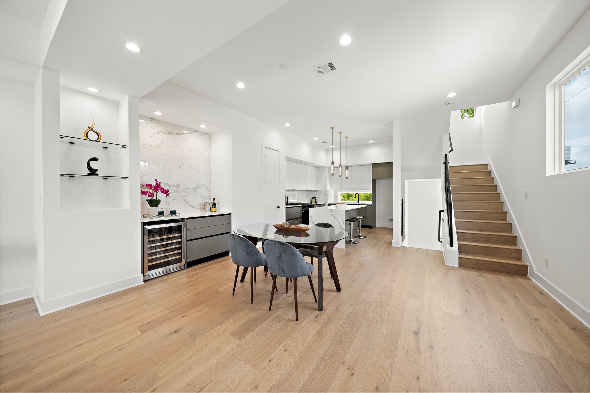 1607 Barbee Street Houston, TX 77004 - Photo 11 of 27 A bright and modern open-concept design enhanced by the warmth and elegance of European white oak engineering wood floors.