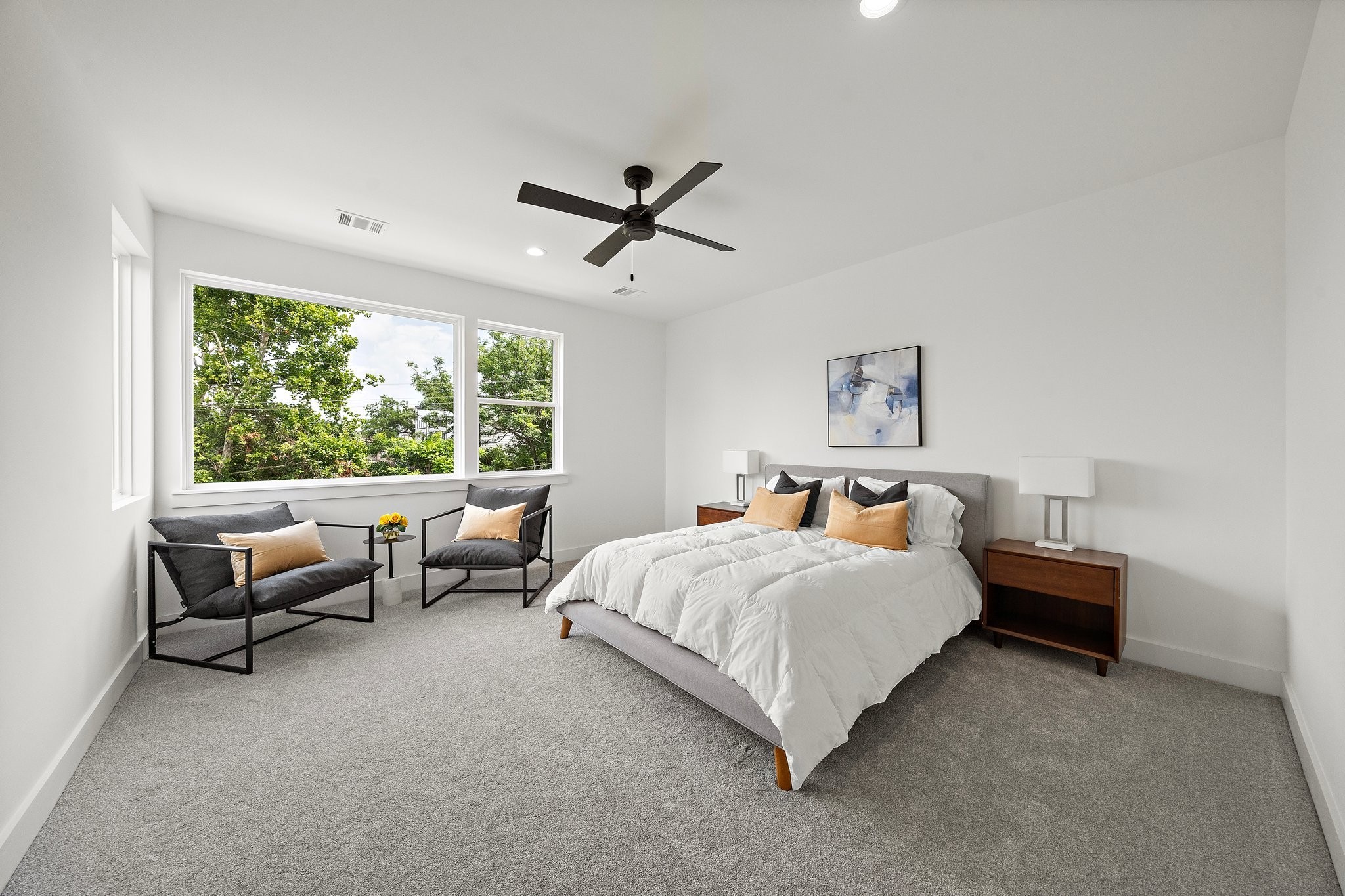 1607 Barbee Street Houston, TX 77004 - Photo 15 of 27 The generously sized primary bedroom offers an abundance of natural light, creating a bright and welcoming retreat.