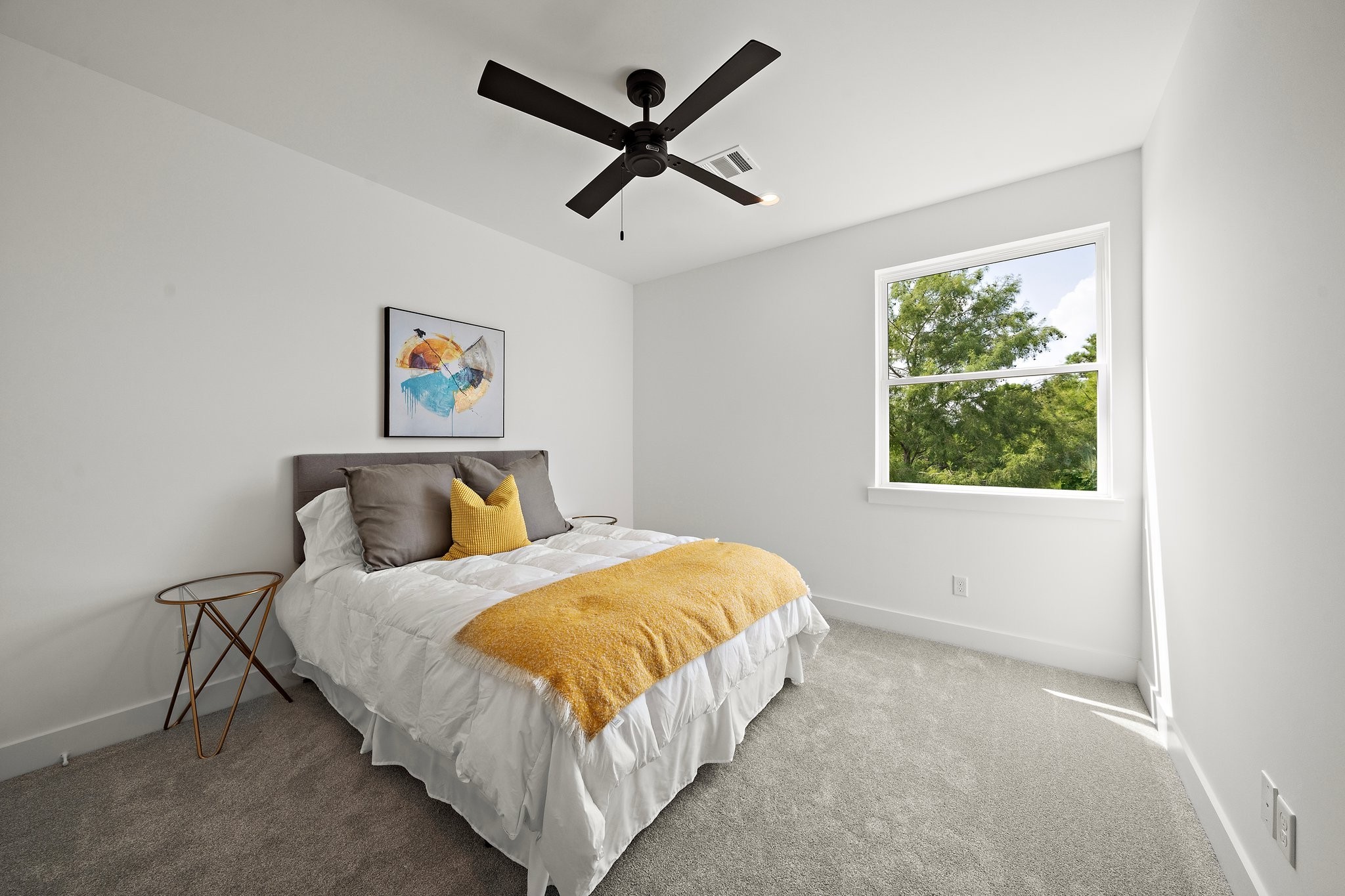 1607 Barbee Street Houston, TX 77004 - Photo 18 of 27 This charming secondary bedroom with bathroom access offers plenty of space, natural light, and a versatile layout, perfect for family members, a home office, or guests.