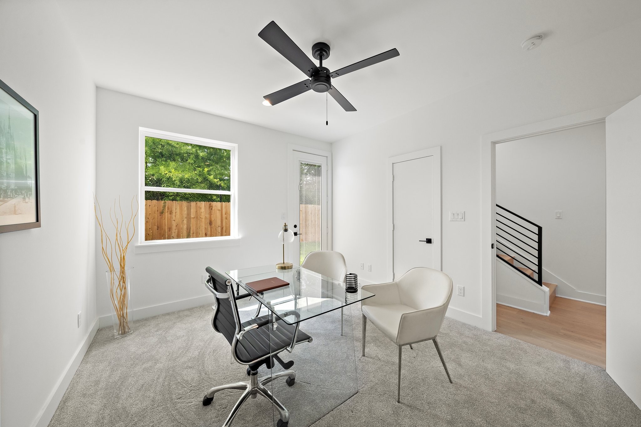 1607 Barbee Street Houston, TX 77004 - Photo 6 of 27 This versatile room downstairs with a bathroom offers endless possibilities, perfect for use as a home office, playroom, or additional bedroom. With plenty of natural light and a flexible layout, it can easily adapt to suit your needs.