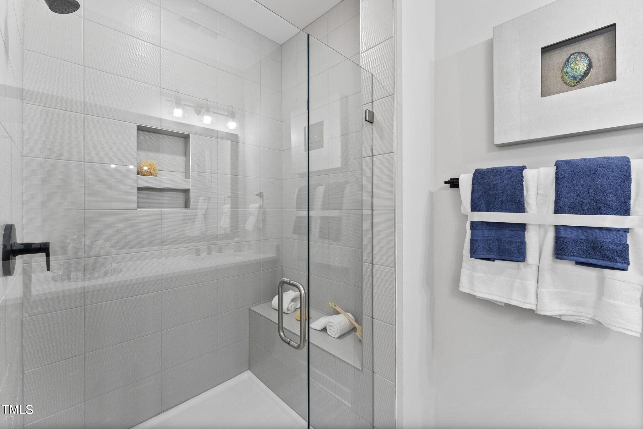 2130 Mars Hill Lane Apex, NC 27502 - Photo 12 of 21 a bathroom with a bathtub and a shower