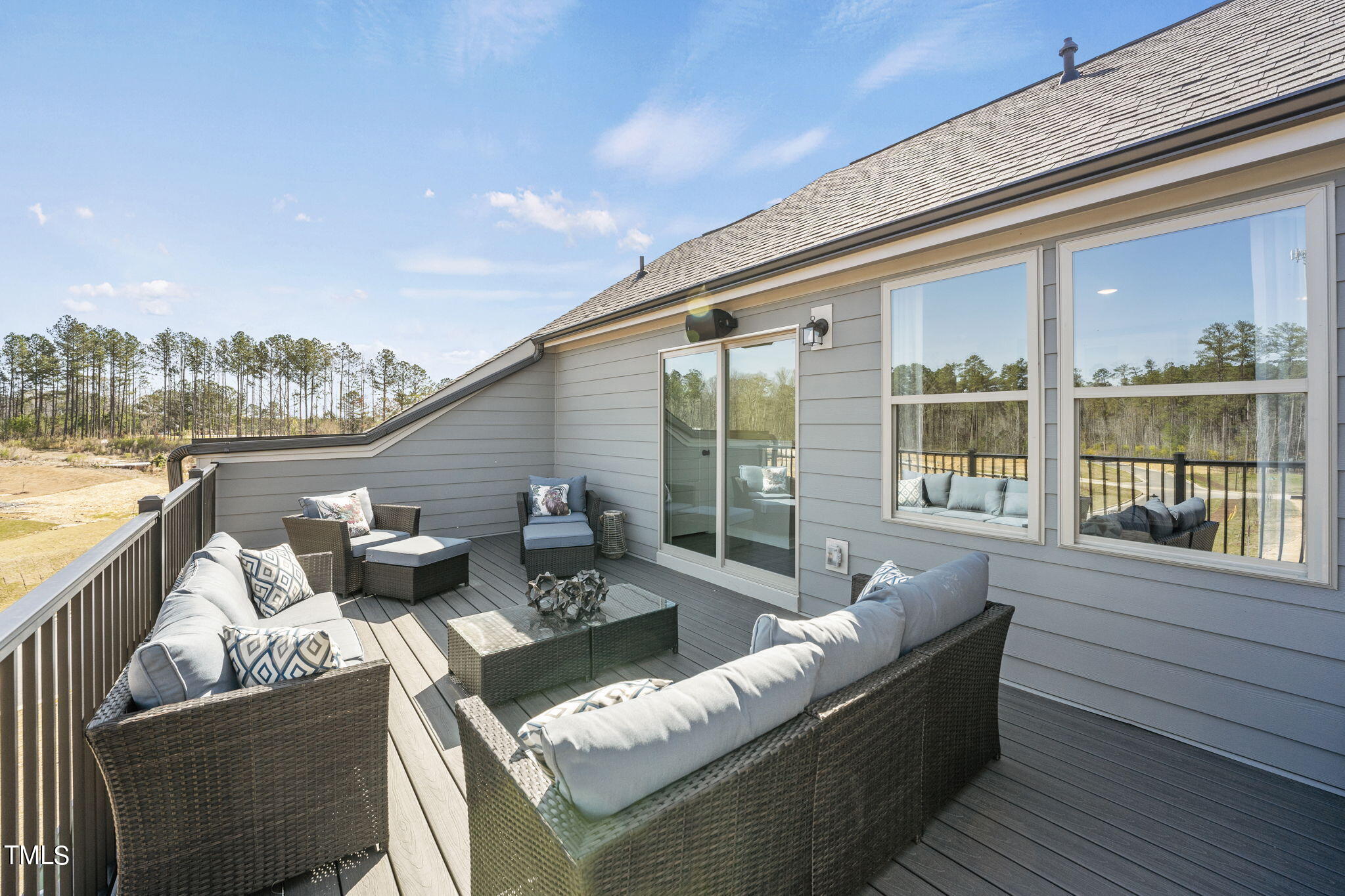 2130 Mars Hill Lane Apex, NC 27502 - Photo 18 of 21 a balcony with furniture and a large window