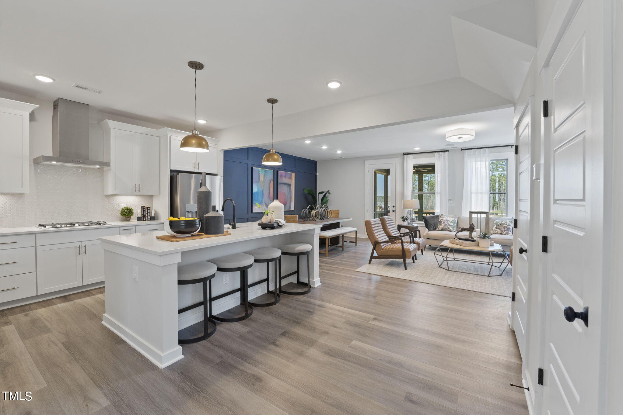 2130 Mars Hill Lane Apex, NC 27502 - Photo 2 of 21 a kitchen with counter top space a sink appliances and cabinets