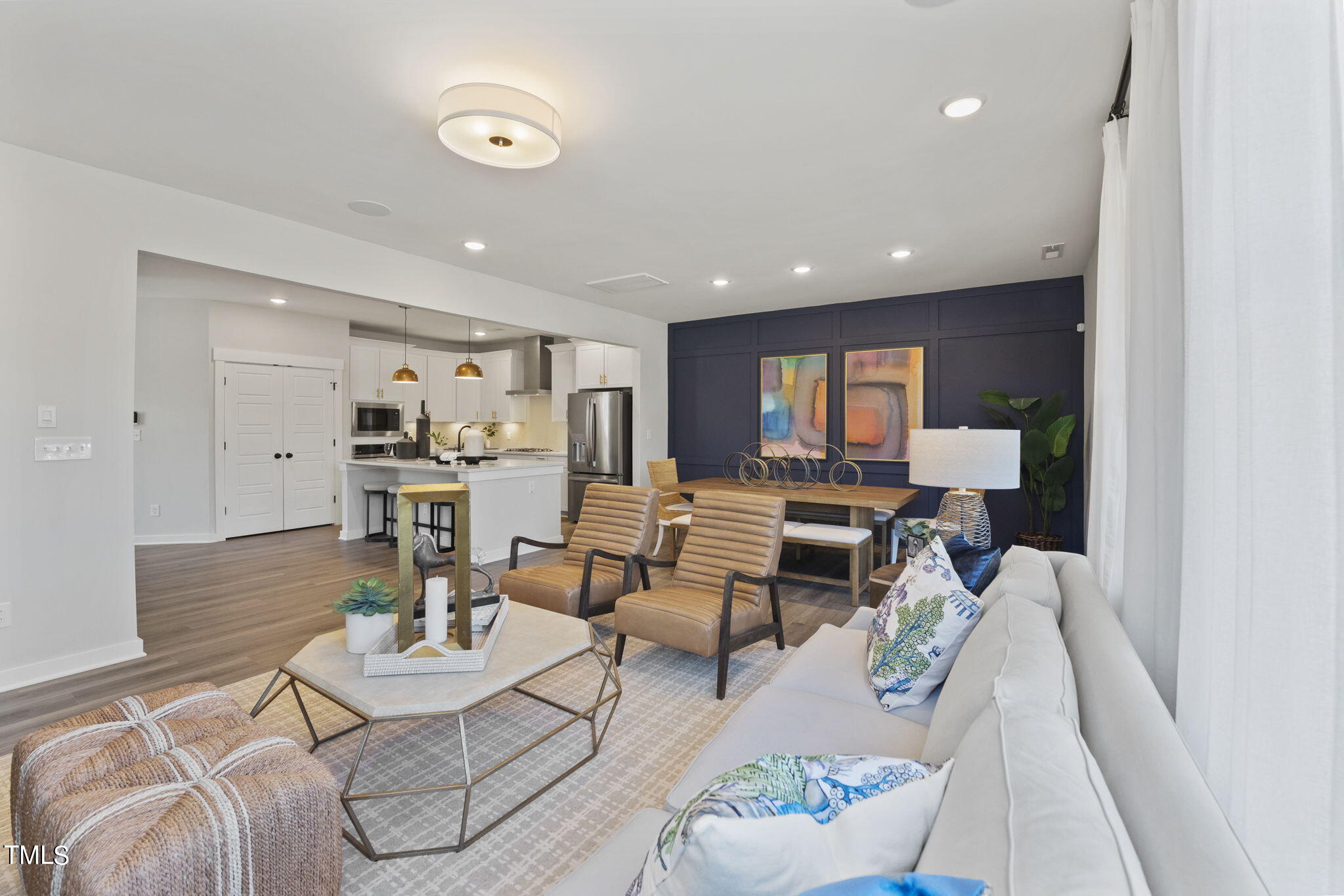 2130 Mars Hill Lane Apex, NC 27502 - Photo 8 of 21 a living room with furniture and a table