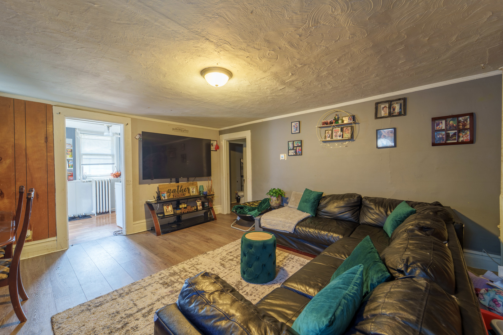 167 Cherry Street Elgin, IL 60120 - Photo 17 of 24 a living room with furniture and a flat screen tv