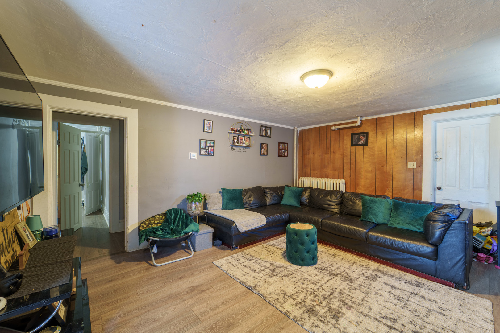 167 Cherry Street Elgin, IL 60120 - Photo 18 of 24 a living room with furniture and wooden floor