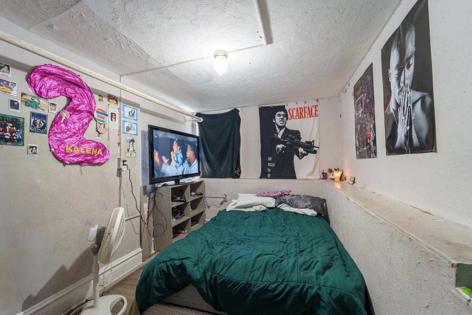 167 Cherry Street Elgin, IL 60120 - Photo 19 of 24 a living room with a couch and a flat screen tv
