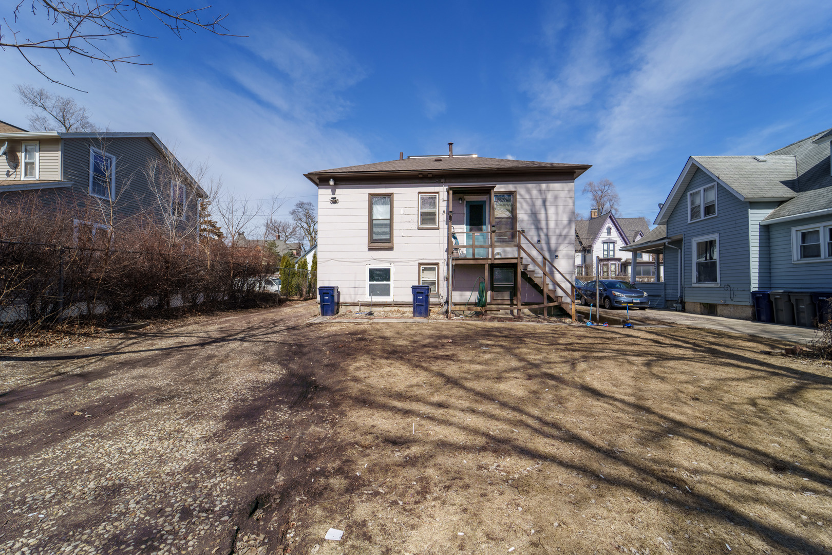 167 Cherry Street Elgin, IL 60120 - Photo 22 of 24 a view of a house with backyard