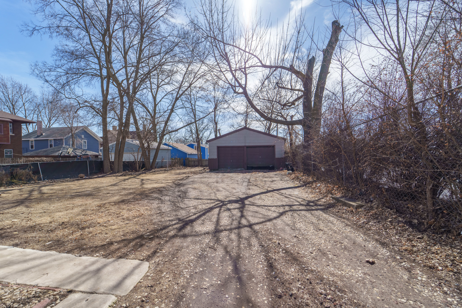 167 Cherry Street Elgin, IL 60120 - Photo 23 of 24 a view of a yard covered with snow in front of house