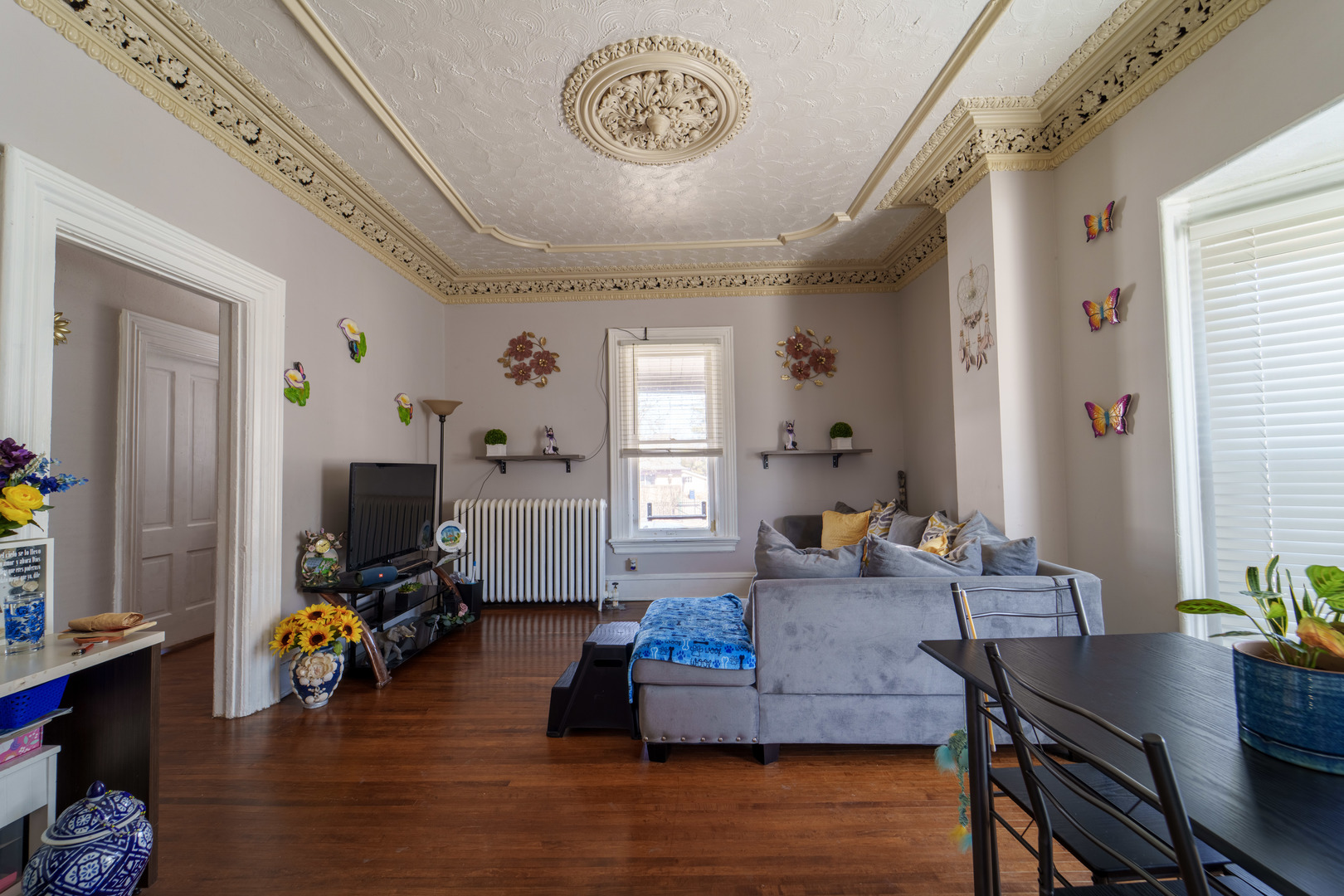 167 Cherry Street Elgin, IL 60120 - Photo 9 of 24 a living room with furniture and a wooden floor