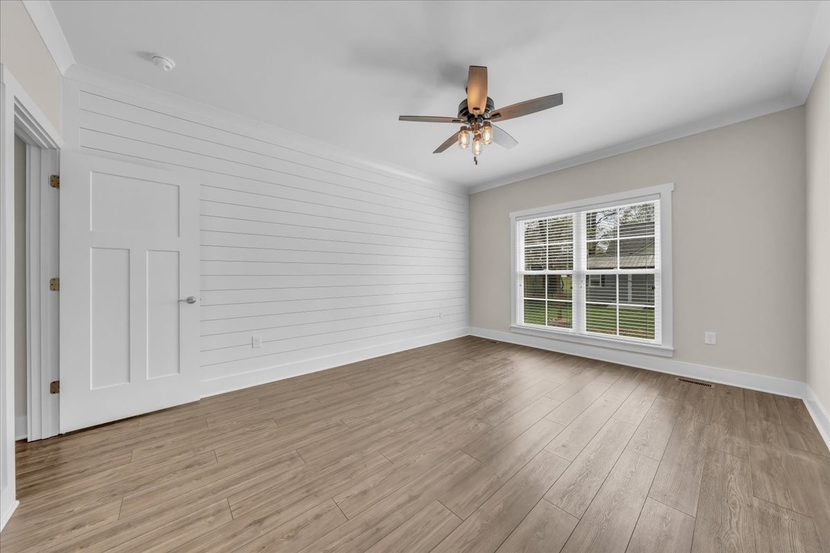 188 Bluegrass Drive Manchester, TN 37355 - Photo 31 of 84 a view of room with wooden floor fan and windows