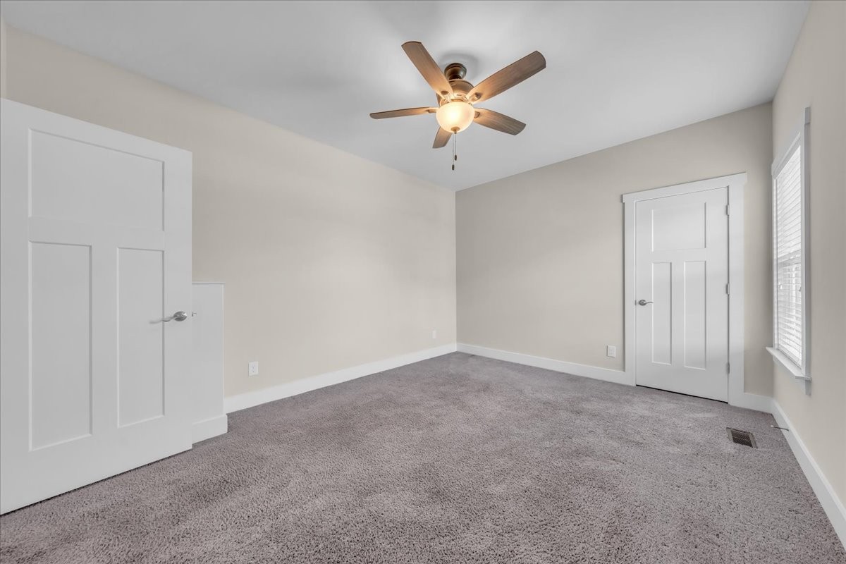 188 Bluegrass Drive Manchester, TN 37355 - Photo 42 of 84 an empty room with closet and fan