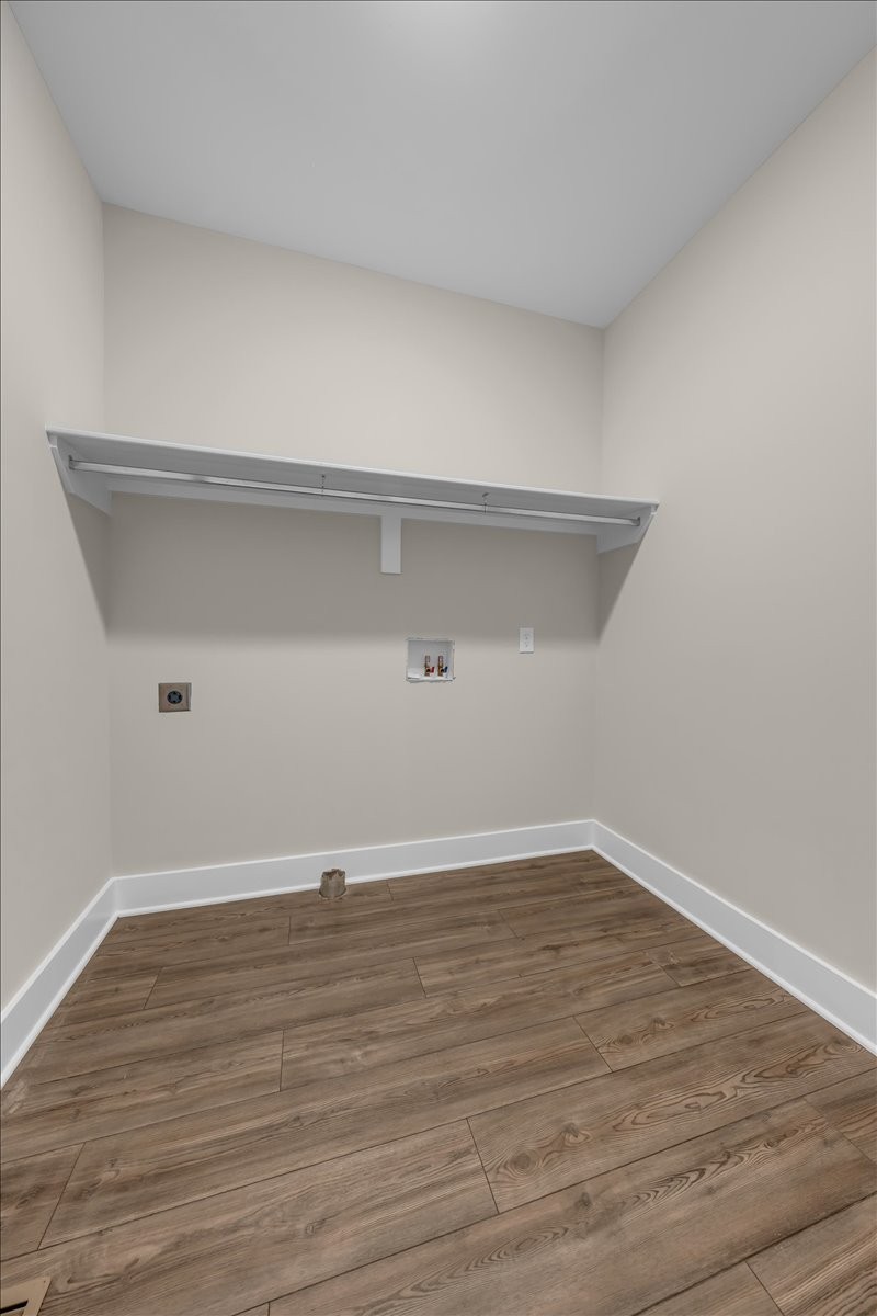 188 Bluegrass Drive Manchester, TN 37355 - Photo 48 of 84 a view of an empty room with wooden floor