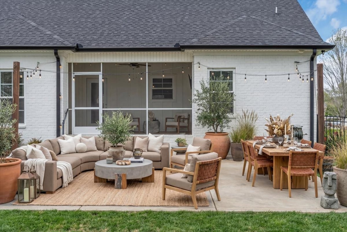 188 Bluegrass Drive Manchester, TN 37355 - Photo 68 of 84 a view of a patio with couches table and chairs and potted plants