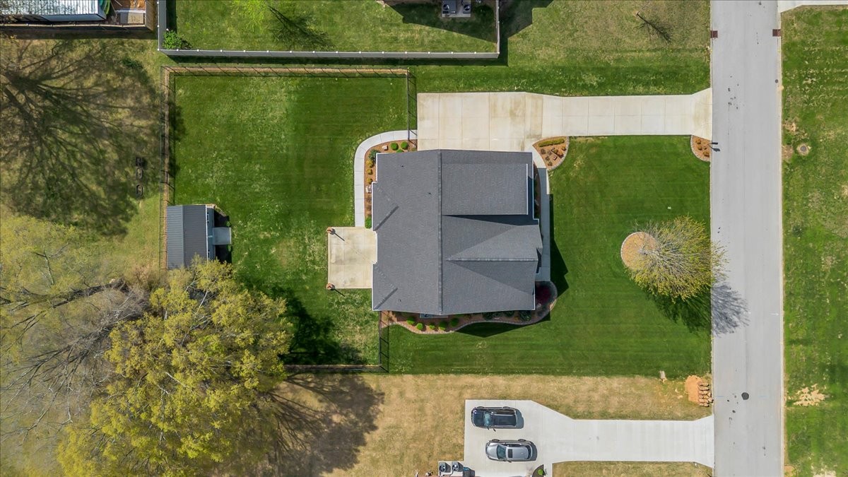 188 Bluegrass Drive Manchester, TN 37355 - Photo 82 of 84 an aerial view of a house with a yard basket ball court and outdoor seating