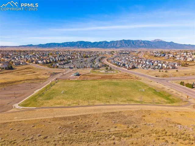 a view of an ocean and a mountain