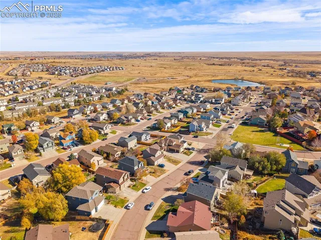 an aerial view of residential building and lake view