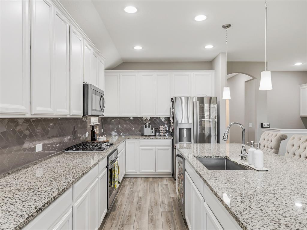2809 Ranger Lane Aubrey, TX 76227 - Photo 10 of 34 Plenty of Counter and Cabinet Space for all Your Storage and Cooking Needs.
