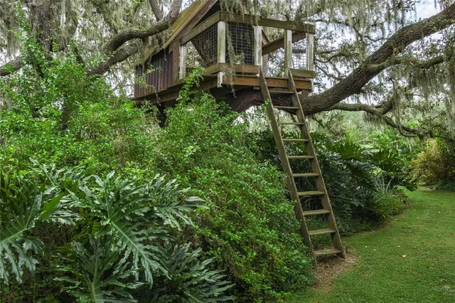 a view of parking garage with cars