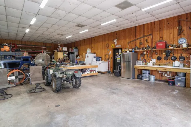 a front view of a house with a yard table and chairs