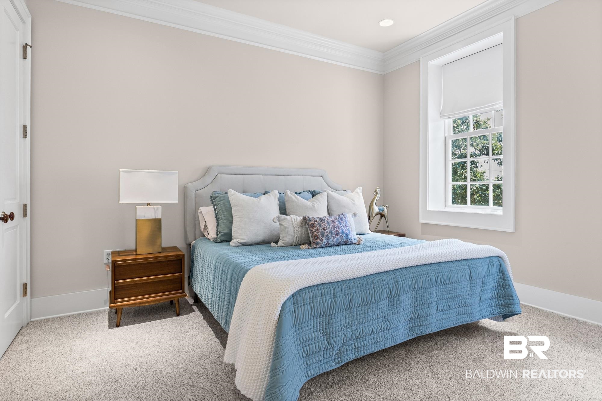 701 Dauphin Street, Unit A Mobile, AL 36602 - Photo 21 of 31 Neutral wall color with crown molding, recessed lighting, and carpeted flooring