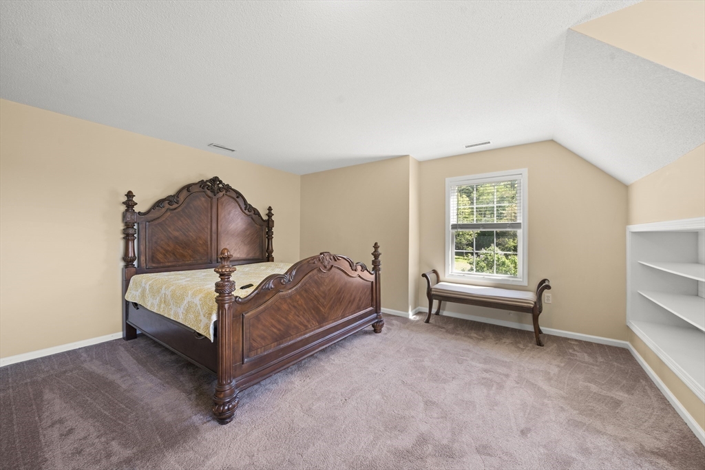 1507 East Mountain Road Westfield, MA 01085 - Photo 17 of 42 a bedroom with a bed and a window