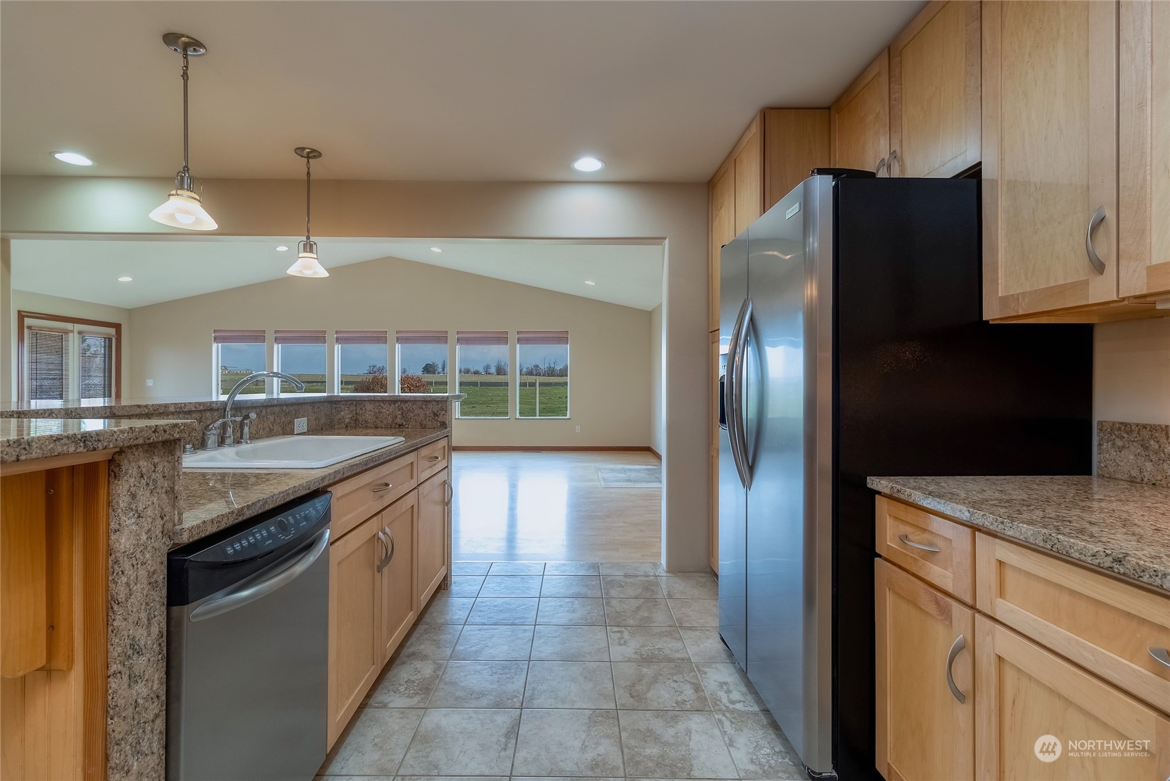266 Thurber Road Touchet, WA 99360 - Photo 12 of 39 a kitchen with stainless steel appliances granite countertop a refrigerator a sink and a stove