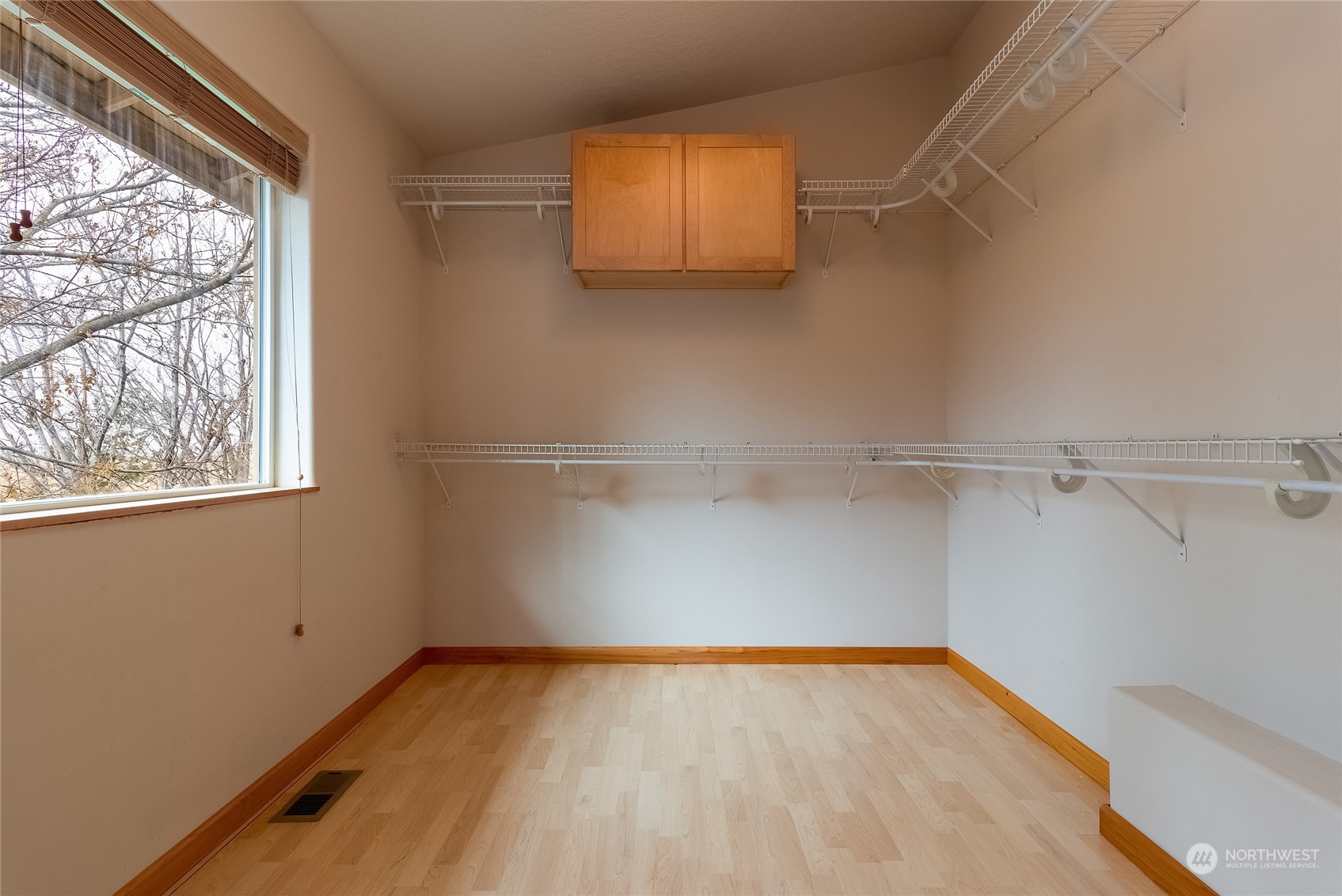 266 Thurber Road Touchet, WA 99360 - Photo 28 of 39 a view of a room with wooden floor and a window