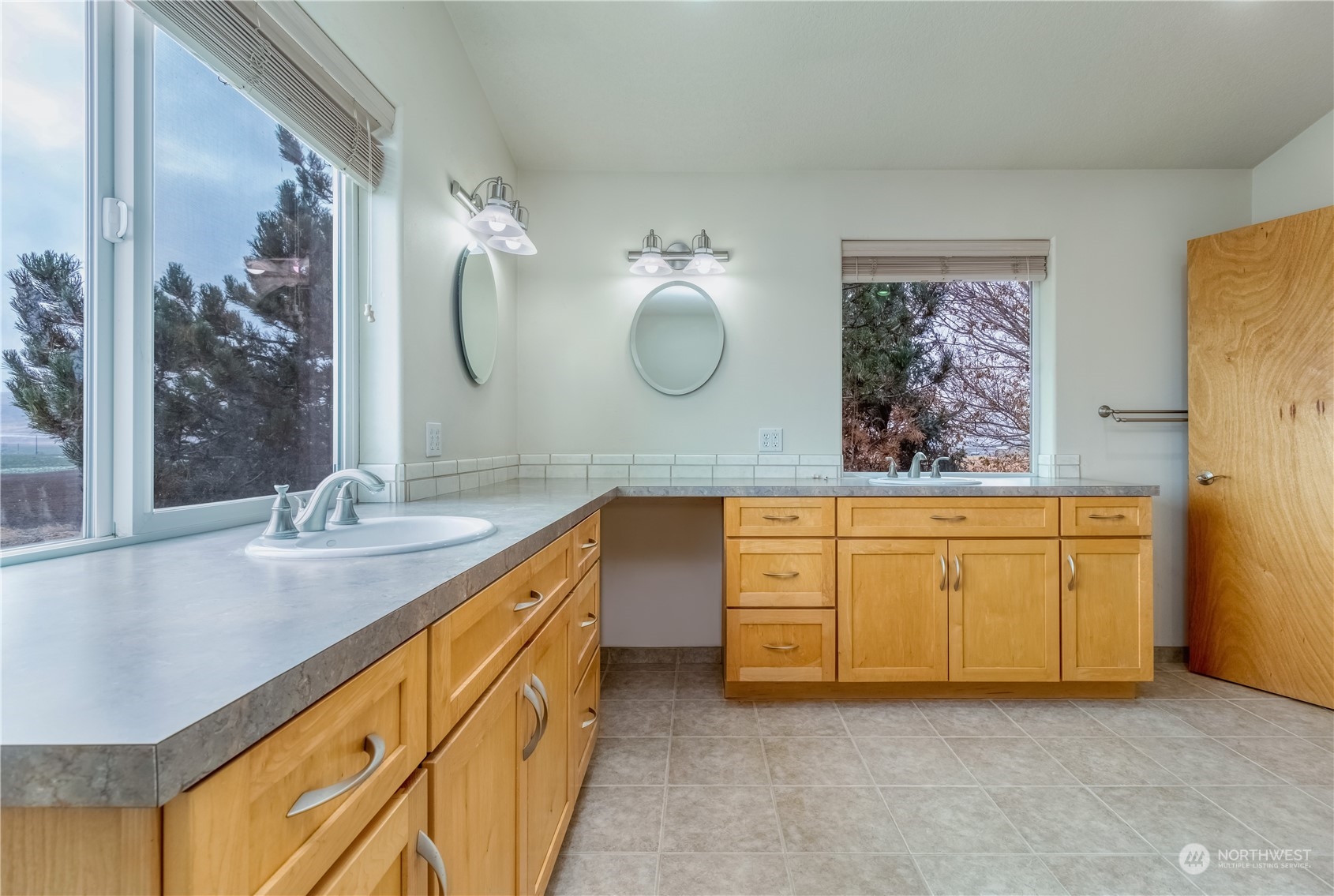 266 Thurber Road Touchet, WA 99360 - Photo 31 of 39 a bathroom with a sink double vanity and a mirror