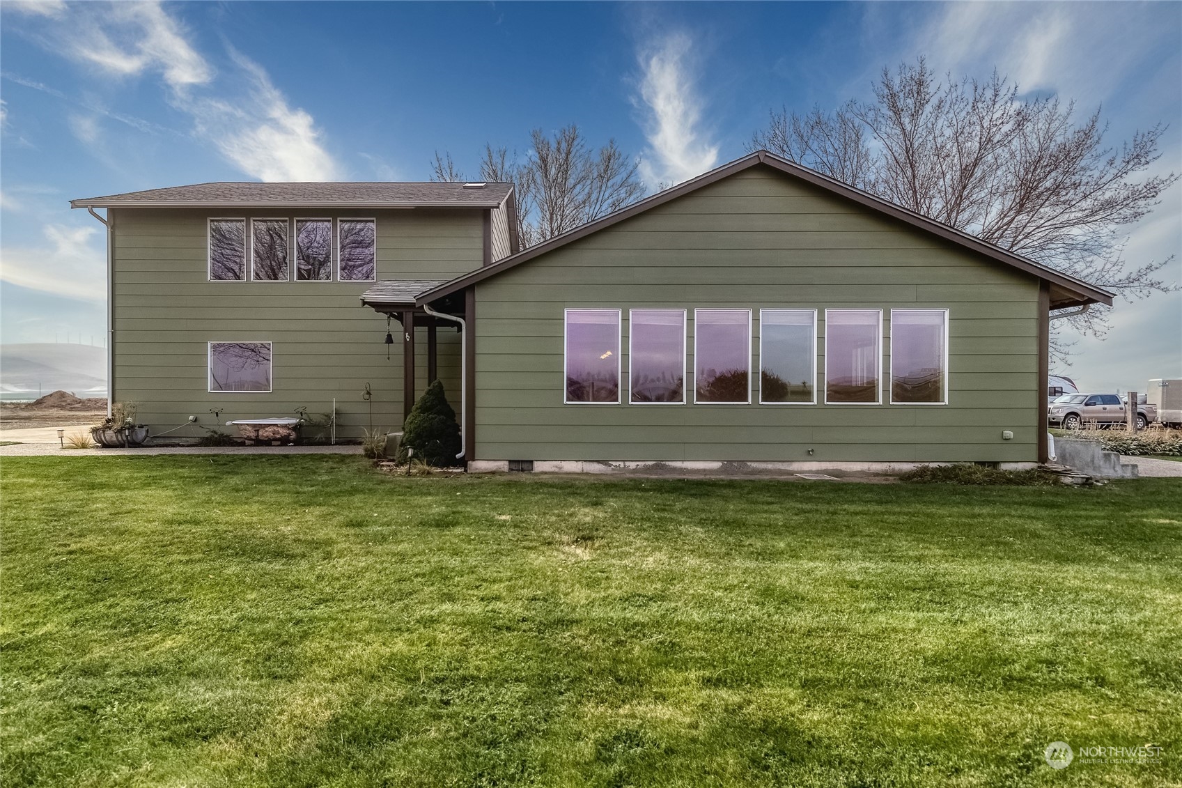 266 Thurber Road Touchet, WA 99360 - Photo 34 of 39 a front view of a house with a yard and garage