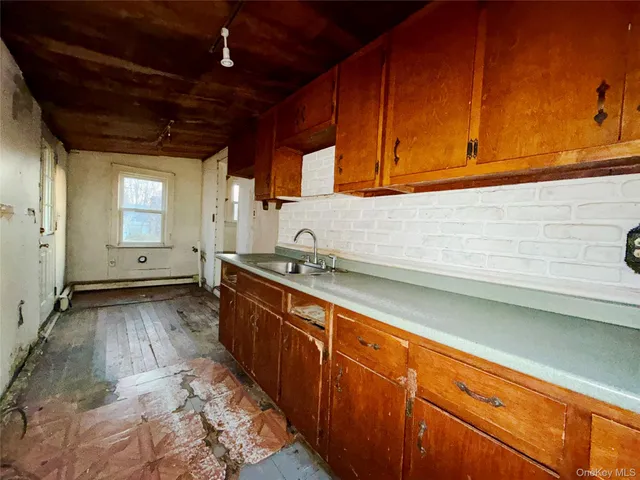 a view of a kitchen with sink