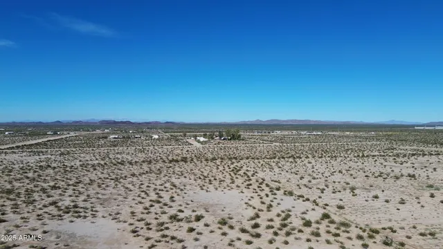 a view of a beach with a ocean view