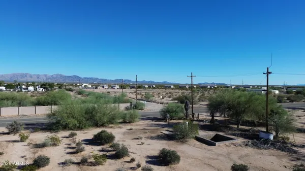 a view of wooden floor and a building