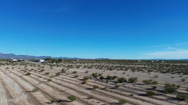 a view of beach and an ocean
