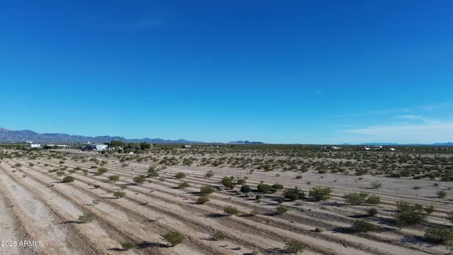 a view of beach and an ocean