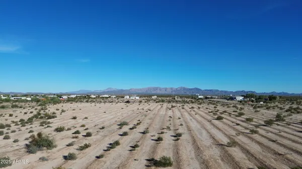 a view of beach and an ocean