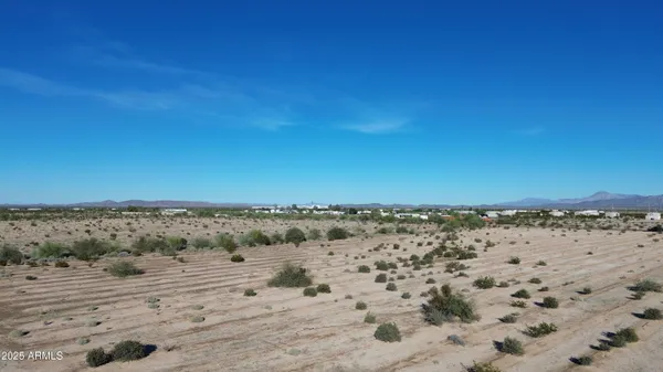 a view of beach and an ocean