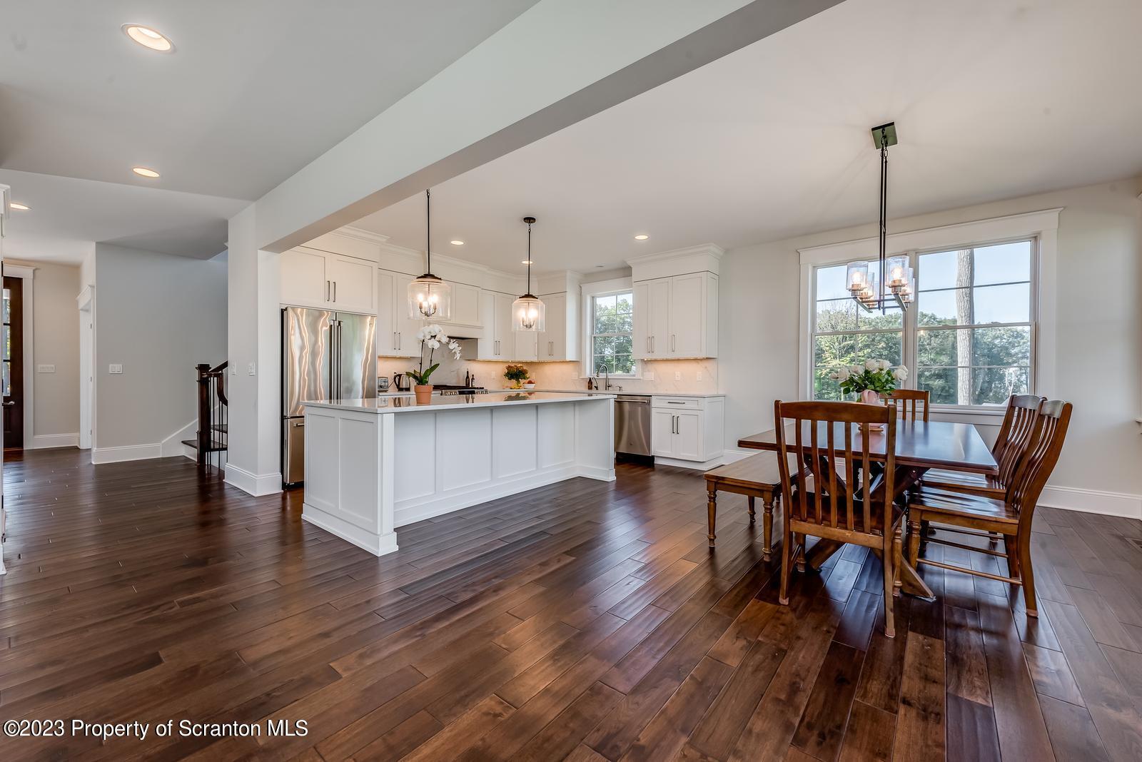 115 Rock Ridge Drive Clarks Summit, PA 18411 - Photo 14 of 43 a view of a dining room with furniture window and wooden floor